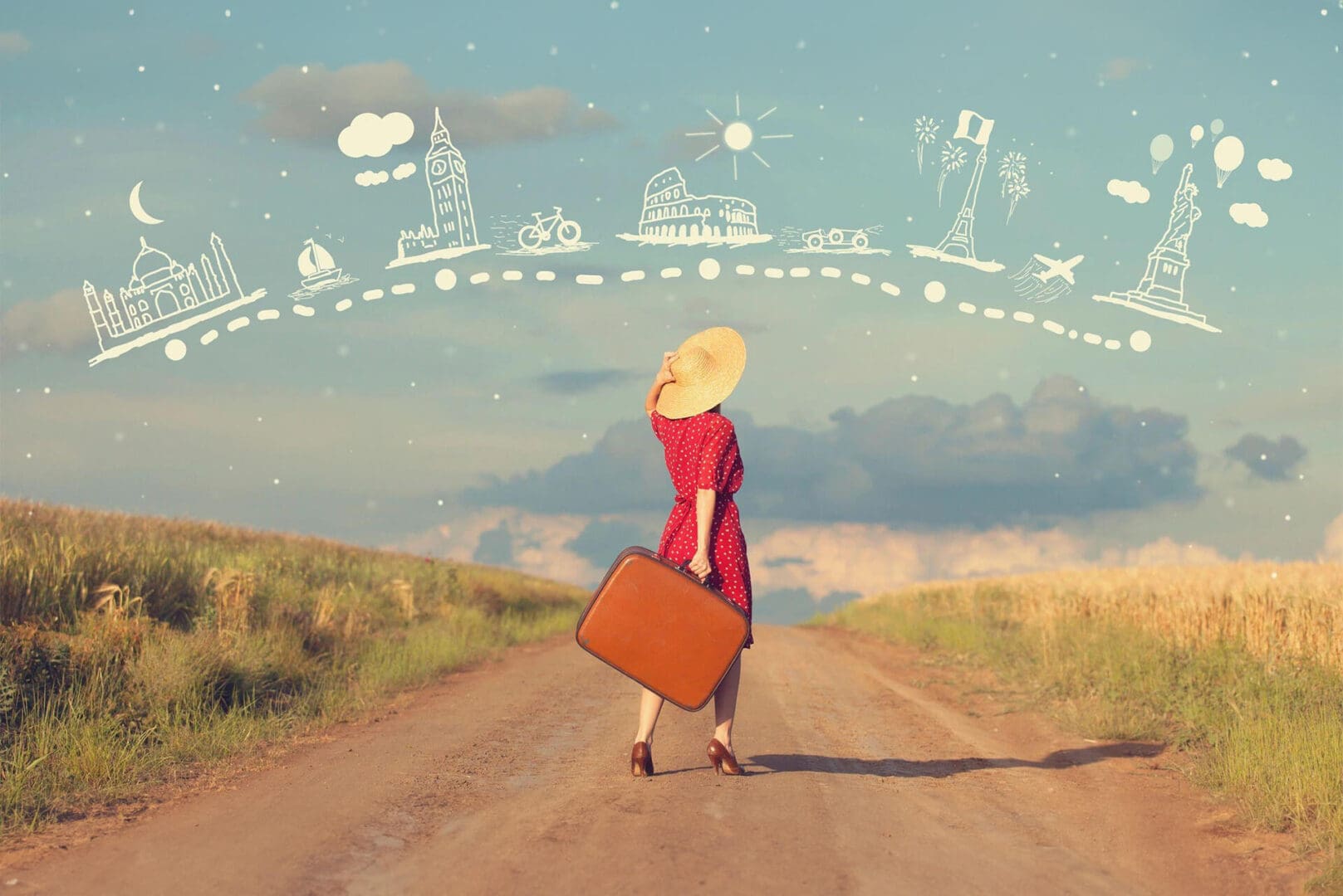 A woman in red dress holding suitcase on dirt road.